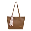 Caramel brown pebbled leather tote bag with geometric silk scarf on handle - Brown
