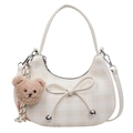 Cream plaid crescent bag with bow detail and bear charm for crossbody or hand carry - Off White