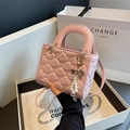 Pink heart quilted handbag with gold studs, pearl bow charm, and top handle straps - Pink