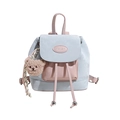 Mini sac à dos bicolore bleu et rose avec breloque ours et logo en métal poli - Bleu