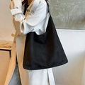 Minimalist black matte underarm tote bag worn with a white trench coat for office commute - 36*13*31 / Black