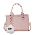Pink minimalist handbag with knotted handle and white plush monster charm in matte finish - Pink