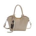 Beige lychee pattern bucket bag with knot handle and creative chocolate charm detail - Beige
