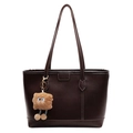 Dark brown faux leather tote bag with white contrast stitching and plush doll charm - Brown