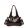Dark brown patent leather tote bag featuring a metallic cross pendant and crossbody strap - Brown