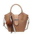 Khaki pebbled leather bucket bag with top handle and cute puppy plush charm accessory - Orange