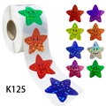 Rotolo di adesivi olografici glitterati a stella con sorriso per premi e decorazioni - Adesivi Premio Stella Sorriso (K125) / 2.5cm