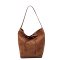 Dark brown suede bucket bag featuring a minimalist bow knot and thin shoulder strap - Brown