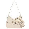 Borsa hobo in vernice crema con fiocco e occhielli argento su sfondo bianco puro - Bianco
