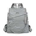 Silbergrauer Damen Rucksack in Knitteroptik mit Metallschnalle und langem Fransenanhänger - Grau