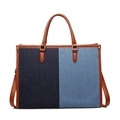 Retro denim tote bag featuring blue patchwork design with brown leather handles - Blue