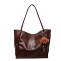 Dark brown faux leather tote bag with slim shoulder straps and plush puppy charm - Brown With Pendant