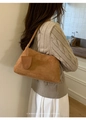 Close-up detail of caramel suede shoulder bag featuring a unique strap knot design - With Small Pouch / 6139 Brown
