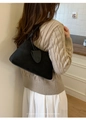 Detail view of the matte black shoulder bag showing the suede texture and leather charm - With Small Pouch / 6139 Black