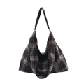 Borsa tote in lana a contrasto con motivo a quadri bianco e nero e rivetti dorati - Nero
