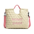 Off-white quilted tote bag with pink straps and embroidery shown from a front angle - Off White