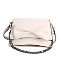 White shoulder bag with a large decorative bow and black chunky metal chain strap - White
