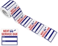 Close-up of waterproof oil change reminder stickers on a roll with date and mileage fields - 150 / Blue
