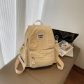 Zaino casual in nylon bianco crema con grande capacità e toppa minimalista per i viaggi - Cachi