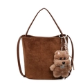 Dark brown suede bucket bag with matching straps and a plush teddy bear charm - With Charm / Brown