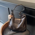 Vintage dark brown PU leather tote bag with large capacity and lion charm - Coffee With Charms