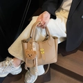 Lychee texture khaki leather bucket bag with golden buckle and cute bear charm - With Pendant / Khaki