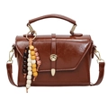 Retro brown faux leather handbag with vintage buckle and colorful bead tassel accessory - With Pendant / Brown