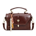 Dark brown glossy luxury handbag with vintage flap, gold clasp and bead tassel - With Pendant / Brown