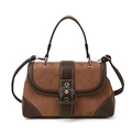 Brown suede and leather crossbody bag featuring a distinctive silver metal ring buckle - Coffee