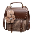 Sac à dos vintage en cuir marron avec détails cousus main et breloque petit chien - Avec Pendentif / Marron