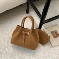 Detail of camel leather tote bag set with contrast stitching and decorative buckle - Brown No Pendant