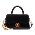 Black minimalist top handle bag with suede flap and vintage metal lock plus beaded charm - With Charm / Black