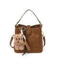 Brown faux leather crossbody bucket bag with contrast stitching and plush puppy charm - With Pendant / Brown