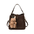 Dark brown matte bucket bag in faux suede with a cute plush dog charm and shoulder strap - With Pendant / Brown