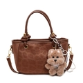 Bruine bucket bag met luipaardprint, pluche hondenbedeltje en gouden schouderriem - Met Hanger / Bruin