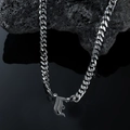 Silver Cuban chain necklace featuring a gothic letter E pendant on volcanic rock - Silver Letter I