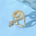 Detailed macro view of gold snake ring with white crystals and red gemstone eyes - Red Eyes Flexible Curve Snake Style (JZ0137)