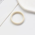 Minimalist seamless elastic hair tie in cream white finish with soft woven texture - Nylon-beige