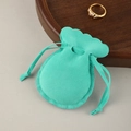 Mint green double-sided velvet jewelry pouch with elegant wavy edges and drawstring closure - Lake Blue