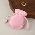 Pink microfiber jewelry pouch with drawstring closure and scalloped edge detail - Pink