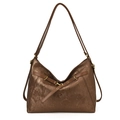 Bronze metallic tote bag with vertical texture and vintage buckle detail on white background - Brown