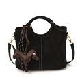 Minimalist black bucket bag in matte leather with white stitching and dog charm - With Pendant / Black