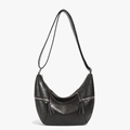Black vintage textured crescent dumpling bag in glossy leather with twin zipper tassels - Coffee