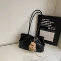 Minimalist black faux leather tote bag with a cute plush puppy charm on a clean white surface - With Pendant / Black