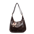 Dark brown faux leather crescent hobo bag with a cute sheep plush charm on the shoulder strap - Coffee