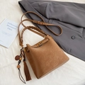 Vintage camel matte bucket bag with a braided handle and stylish tassel pendant charm - With Pendant / Brown
