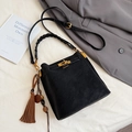 Retro black matte velvet bucket bag with gold lock and braided handle on grey blazer - With Pendant / Black