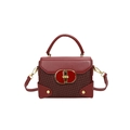 Vintage burgundy woven satchel with golden oval clasp and leather stitching detail - Burgundy