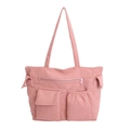 Pink corduroy shoulder tote bag with multiple front pockets in a minimalist style - Pink