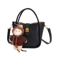 Black pebbled leather tote bag with gold twist lock and a cute bear charm on white background - With Pendant / Black